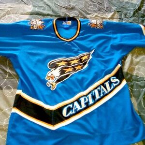 Capital jacket xl fits large 
Capital hockey jersey large